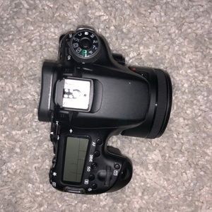 Canon 70D w/Batteries + 55 mm lens and SD card